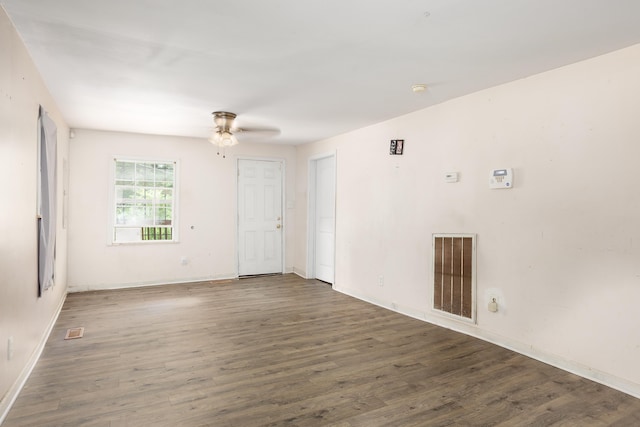  - spare room featuring wood finished floors and a ceiling fan
