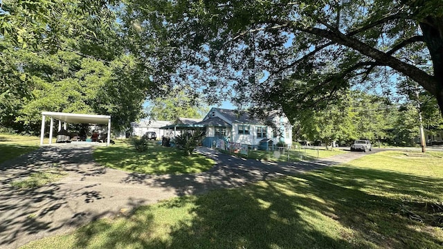 view of yard featuring a carport