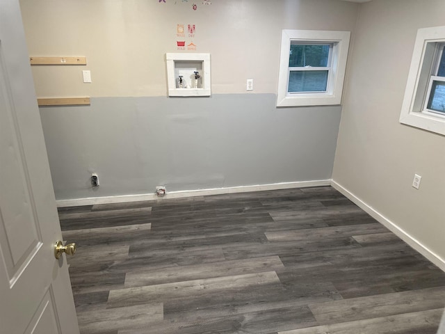 laundry area featuring washer hookup and dark hardwood / wood-style flooring