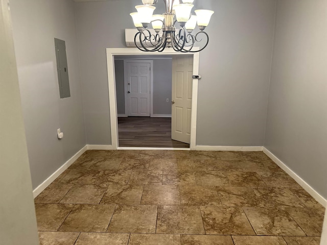 unfurnished dining area with a chandelier and electric panel