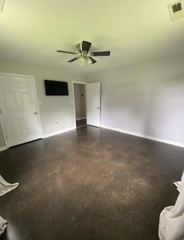  - spare room featuring plenty of natural light and a ceiling fan