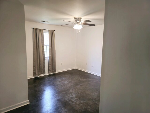  - unfurnished bedroom with a barn door, a closet, and concrete floors