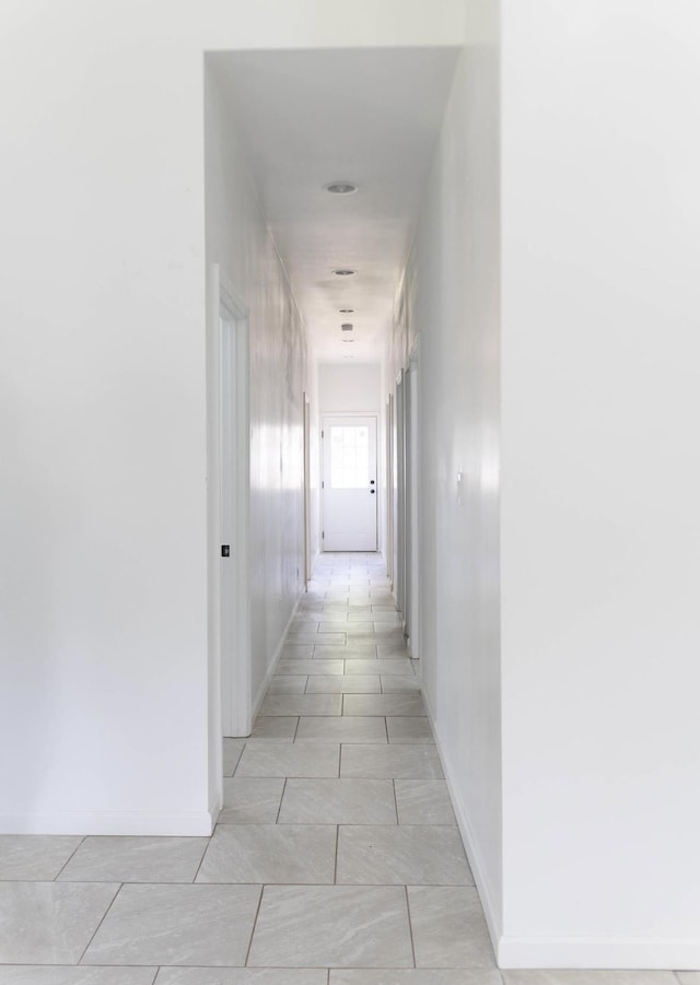  - hallway featuring baseboards