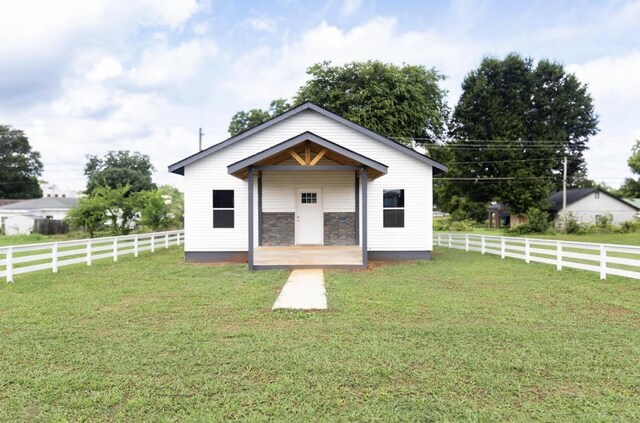  - bungalow-style house featuring a fenced backyard