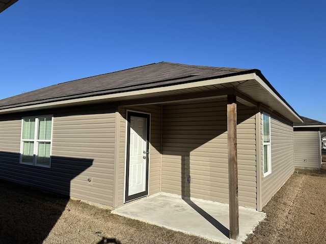 view of home's exterior with a patio area