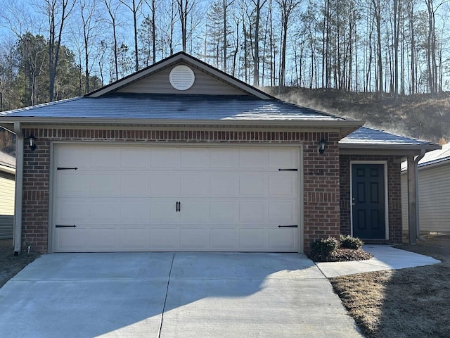 single story home featuring a garage