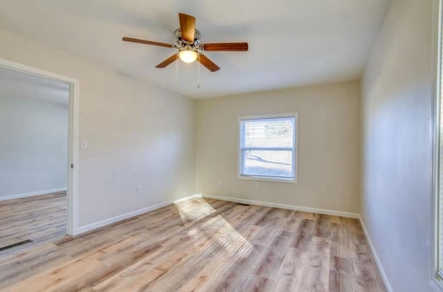 unfurnished room featuring ceiling fan and light hardwood / wood-style floors