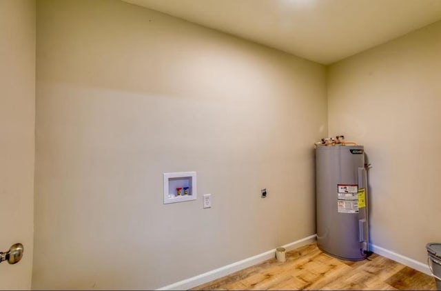 laundry area featuring electric dryer hookup, light wood-type flooring, hookup for a washing machine, and water heater