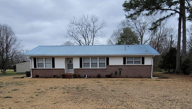 view of front facade featuring a front yard