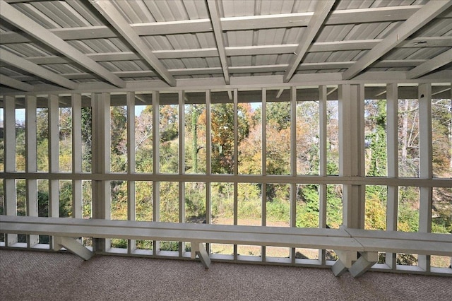 unfurnished sunroom with plenty of natural light