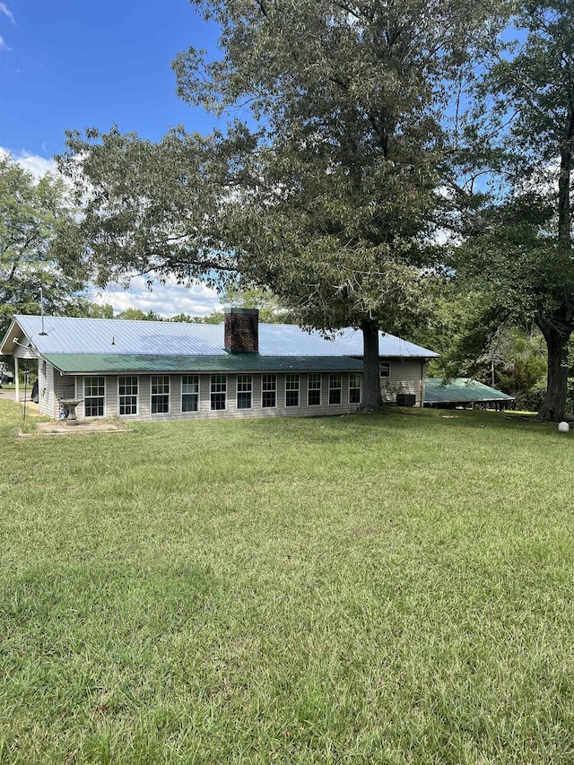 exterior space with a front yard