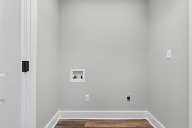 washroom with hookup for a washing machine, dark hardwood / wood-style floors, and hookup for an electric dryer