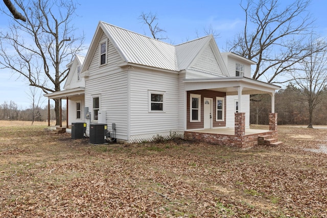 view of front of home with central AC and covered porch