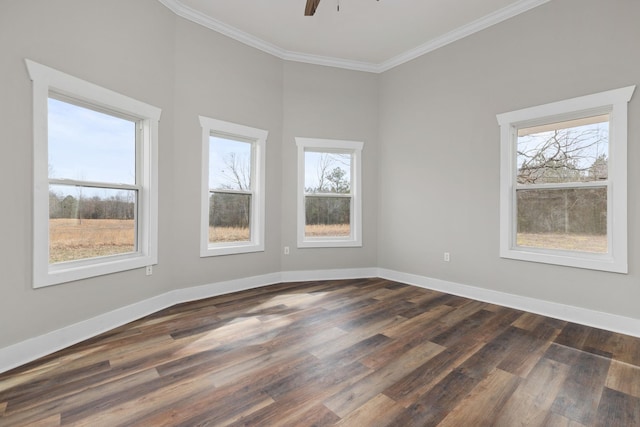 unfurnished room with crown molding, ceiling fan, and dark hardwood / wood-style floors