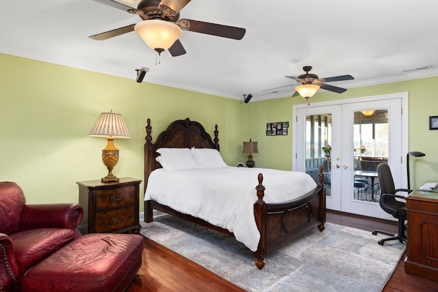 bedroom featuring access to exterior, french doors, dark hardwood / wood-style floors, and ceiling fan