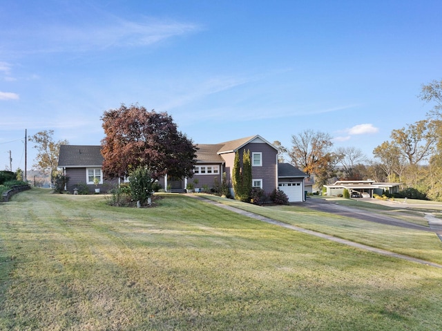 view of front facade featuring a front lawn and a garage