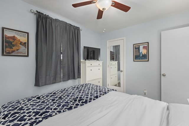bedroom featuring ensuite bathroom and ceiling fan