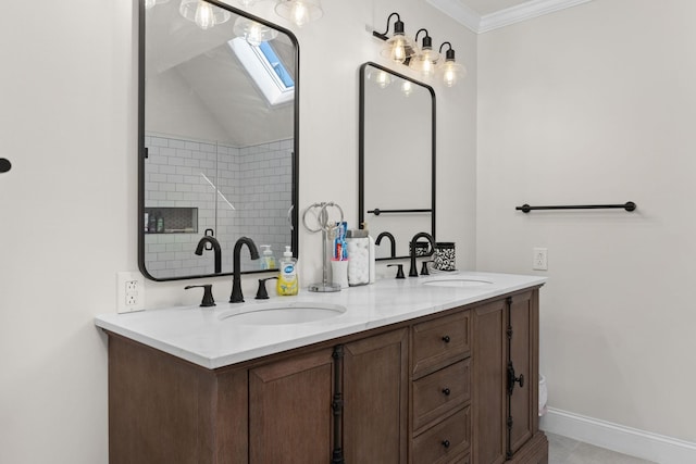 bathroom with vaulted ceiling, double vanity, ornamental molding, and a sink