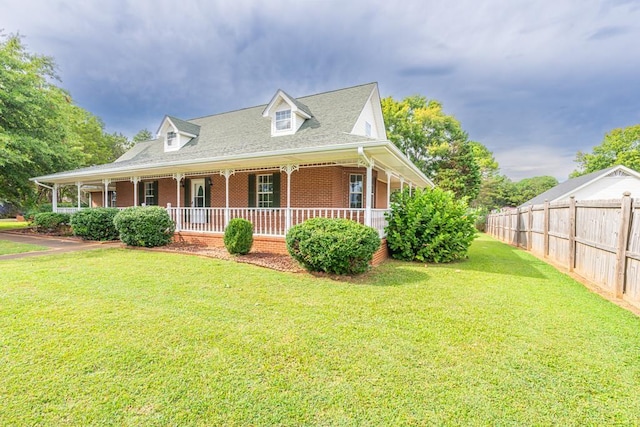 view of front of house featuring a front lawn and a porch