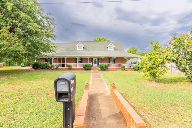 country-style home featuring a front yard and a porch