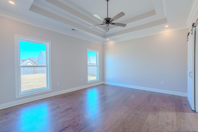 unfurnished room featuring crown molding, dark wood-type flooring, and ceiling fan