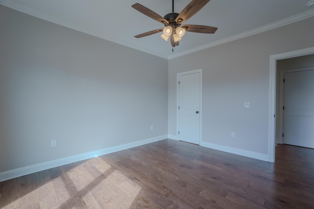 empty room with dark wood-type flooring, crown molding, baseboards, and ceiling fan