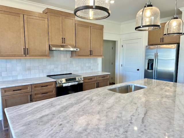 kitchen with crown molding, tasteful backsplash, hanging light fixtures, appliances with stainless steel finishes, and light stone countertops