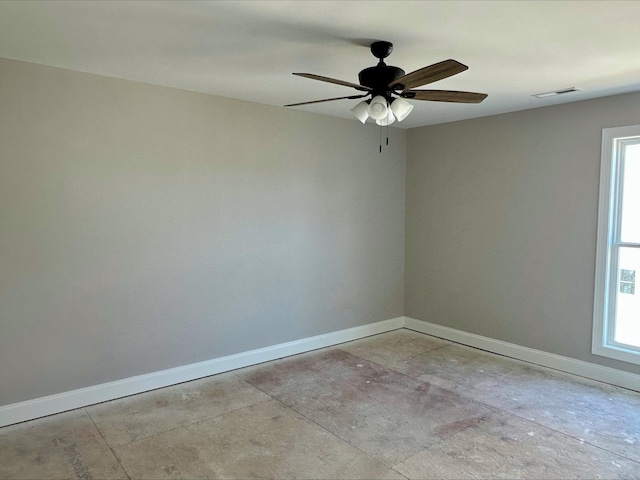 spare room with ceiling fan