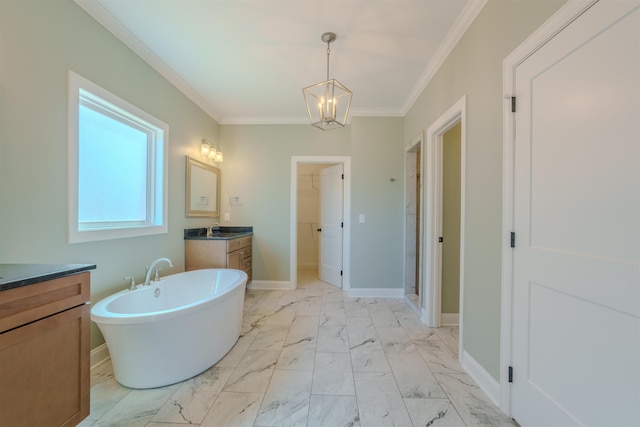 full bathroom featuring a freestanding tub, marble finish floor, crown molding, and baseboards