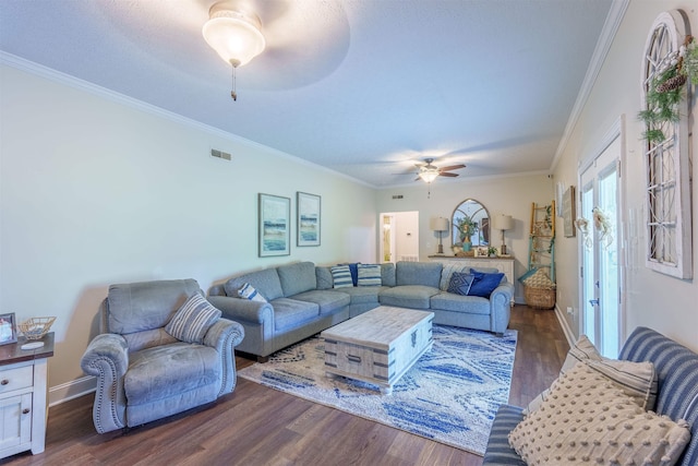  - living room with dark wood-type flooring, ceiling fan, and crown molding