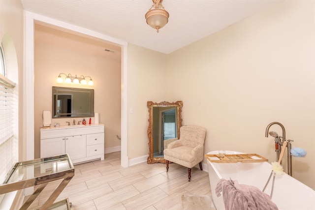  - bathroom with a freestanding bath and vanity