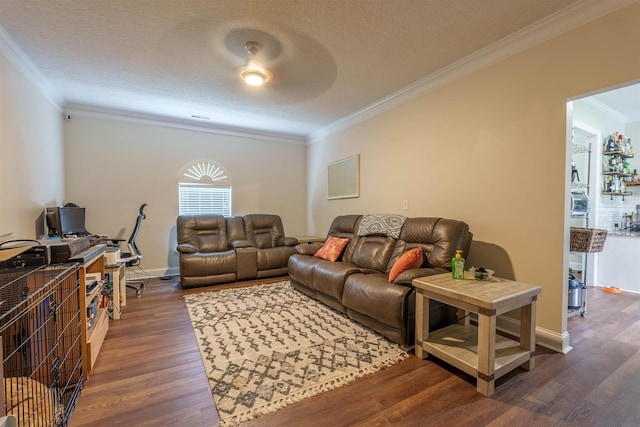  - living area with crown molding, an office area, dark wood finished floors, ceiling fan, and a textured ceiling