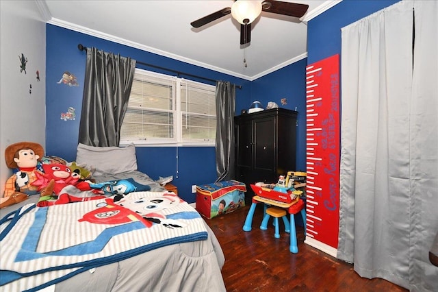 bedroom featuring ceiling fan, crown molding, and dark wood-type flooring