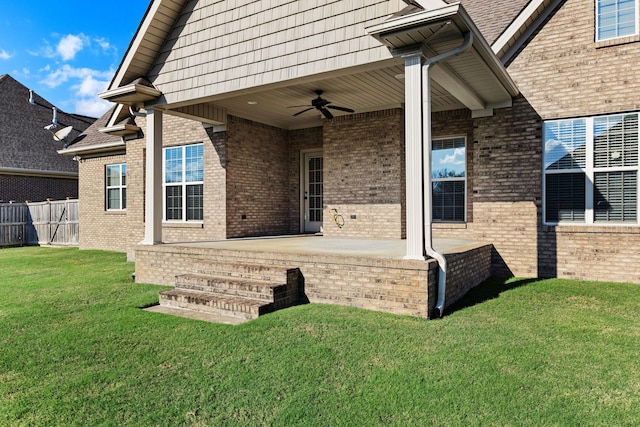 exterior space featuring ceiling fan