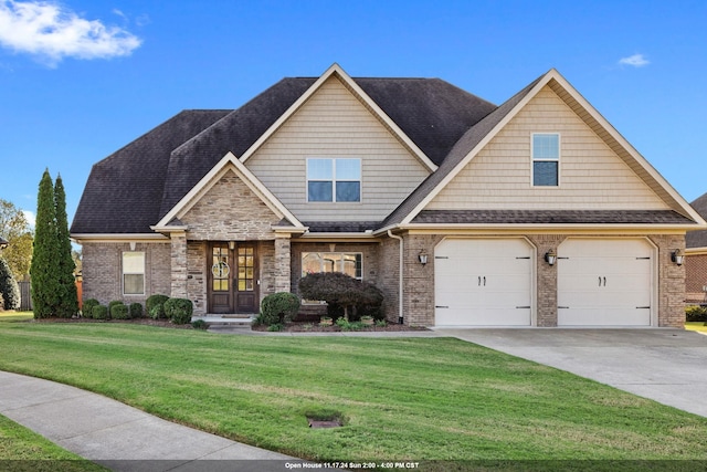 craftsman-style home featuring french doors, a garage, and a front lawn