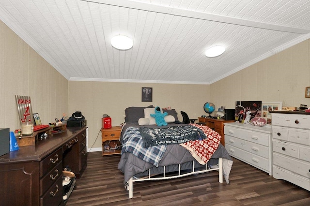 bedroom featuring dark wood-type flooring and crown molding