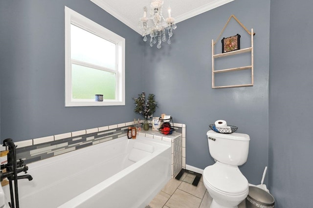 bathroom with a garden tub, crown molding, tile patterned floors, toilet, and a notable chandelier