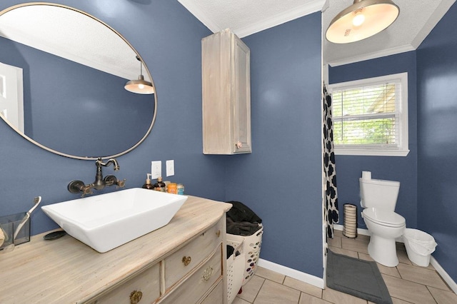 full bath featuring baseboards, ornamental molding, toilet, and vanity