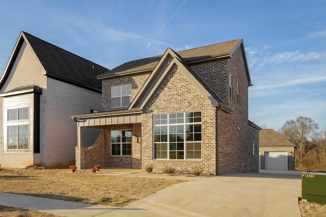 view of front of property featuring a garage, concrete driveway, and brick siding