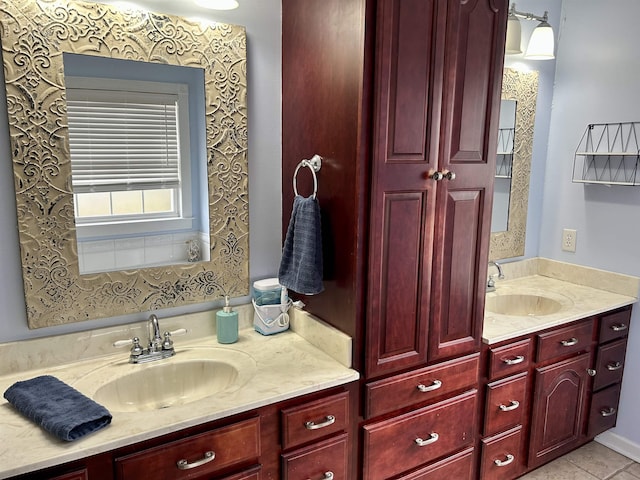 full bathroom featuring tile patterned floors and vanity