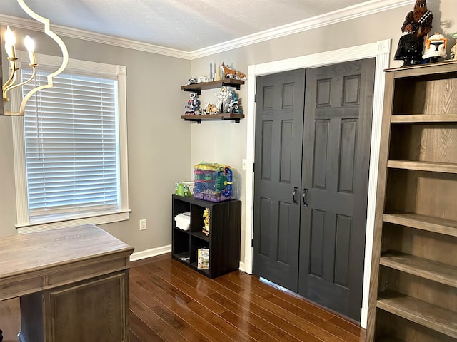 interior space with an inviting chandelier, baseboards, ornamental molding, and dark wood-type flooring