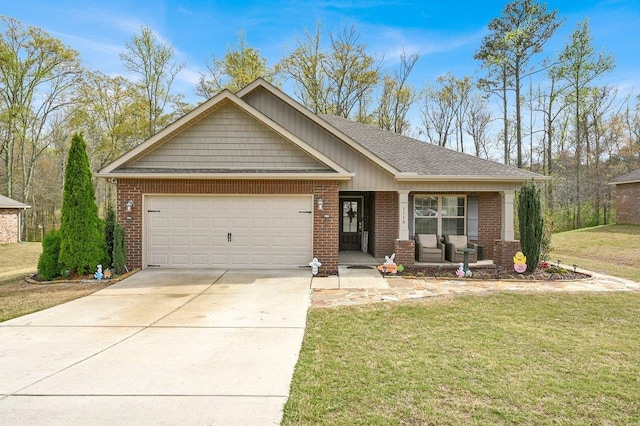 view of front of property featuring covered porch, concrete driveway, brick siding, a front lawn, and a garage