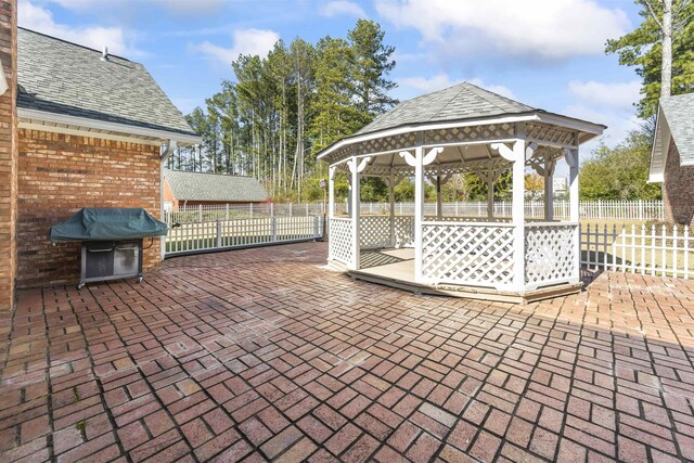 view of patio / terrace with a gazebo and grilling area