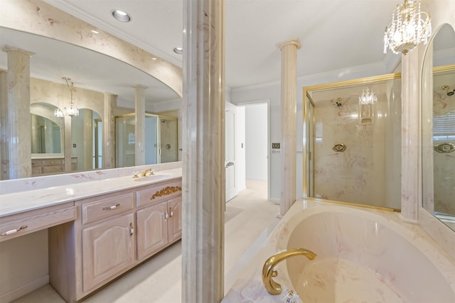 bathroom featuring ornate columns, a chandelier, shower with separate bathtub, vanity, and ornamental molding