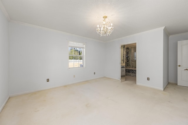 carpeted spare room with crown molding and a chandelier