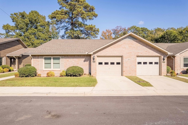 ranch-style house featuring a garage