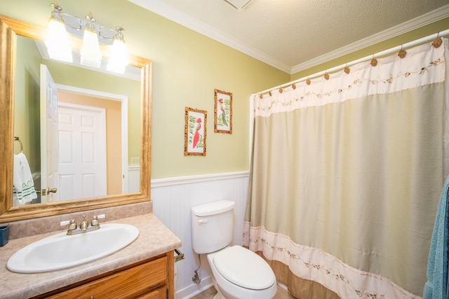 bathroom with vanity, a shower with shower curtain, toilet, ornamental molding, and a textured ceiling