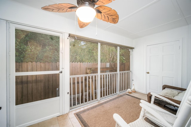 sunroom / solarium with ceiling fan