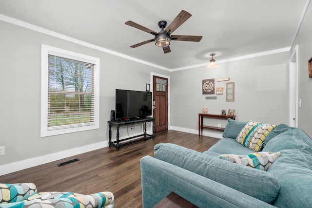 living room with ceiling fan, dark hardwood / wood-style flooring, and ornamental molding