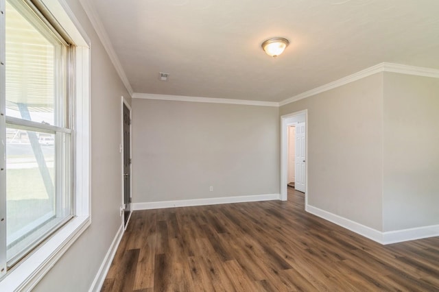 unfurnished room with dark hardwood / wood-style floors and crown molding